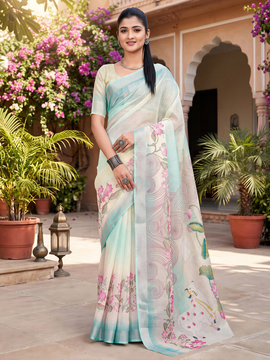 Woman wearing light blue cotton linen saree with traditional indian motif work and light blue blouse