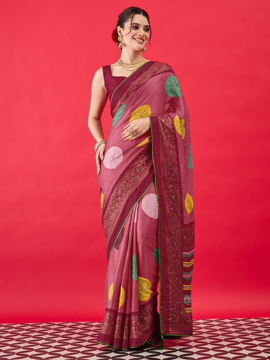 Woman wearing pink georgette saree with bandhani tie-dye dot work and maroon blouse