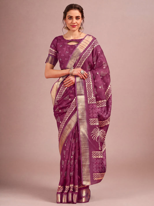 Woman wearing purple cotton silk saree with traditional indian motif work and purple blouse
