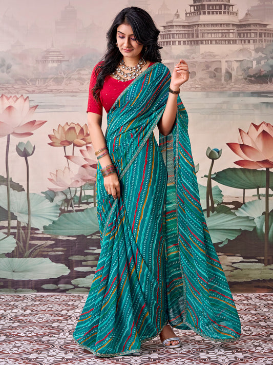 Woman wearing teal green georgette saree with bandhani tie-dye dot work and maroon blouse