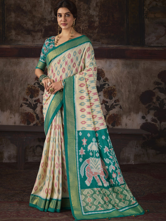 Off White ikat silk blend saree with teal green blouse piece