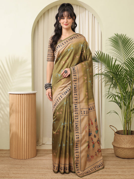 Woman wearing olive silk blend saree with peacock motif design and cream blouse