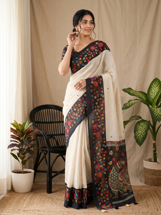 Woman wearing off white linen blend saree with kalamkari narrative motif work and black blouse