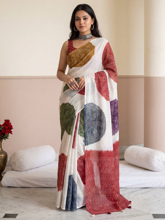 Woman wearing off white linen saree with bandhani tie-dye dot work and red blouse
