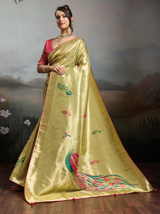 Woman wearing lime green banarasi silk saree with woven motif design and pink blouse