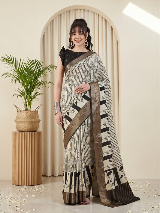 Woman wearing off white viscose silk saree with striped pattern design and black blouse
