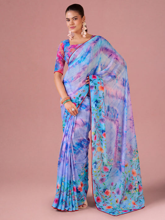 Woman wearing purple georgette saree with all-over floral design and multicolored blouse