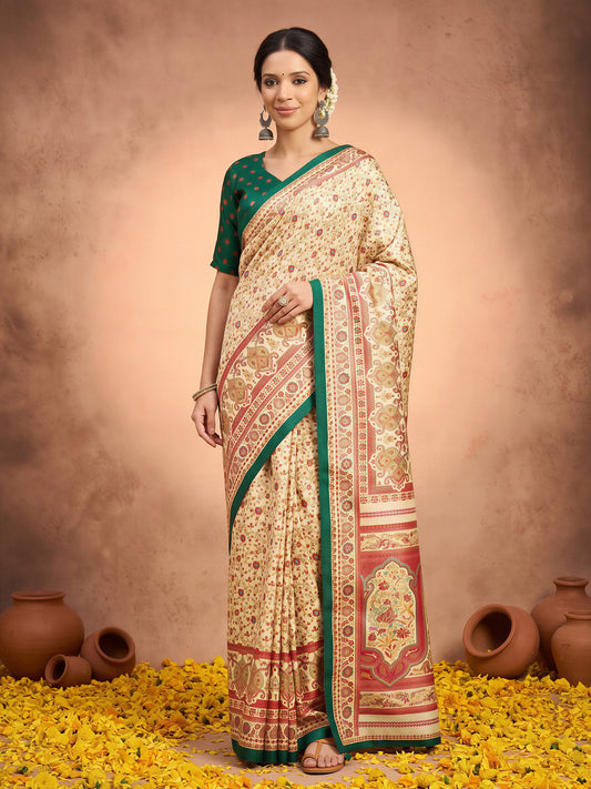 Woman wearing cream silk blend saree with metallic foil print work and green blouse