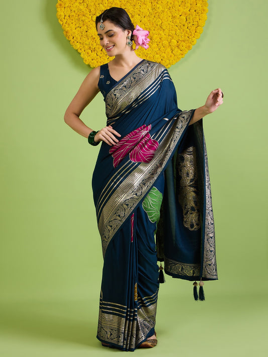 Woman wearing navy blue silk blend saree with zari butta (metallic motif) work and navy blue blouse