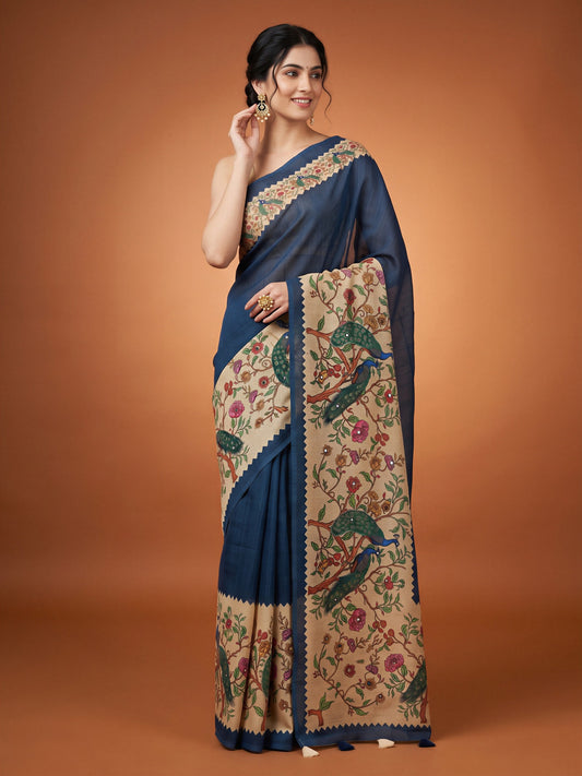 Woman wearing navy blue linen blend saree with kalamkari narrative motif work and beige blouse