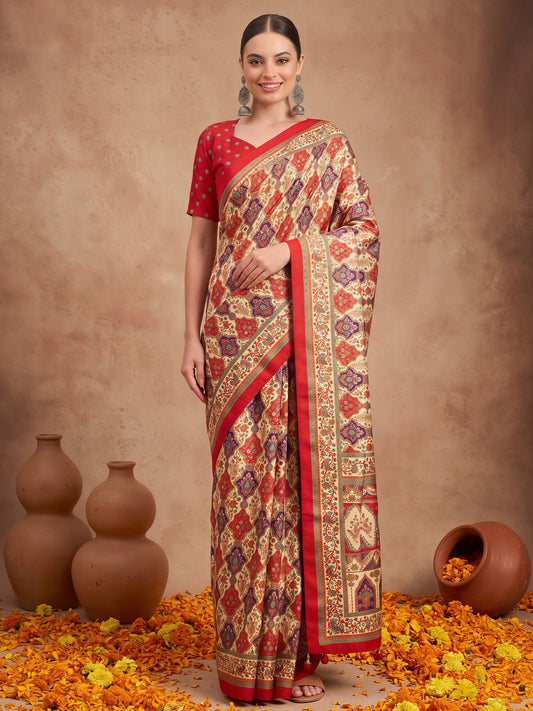 Woman wearing cream silk blend saree with metallic foil print work and red blouse