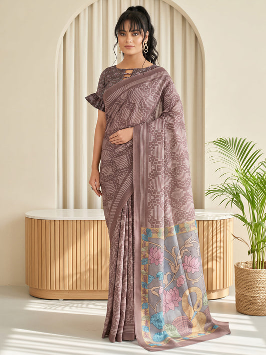 Woman wearing brown linen blend saree with geometric pattern design and brown blouse