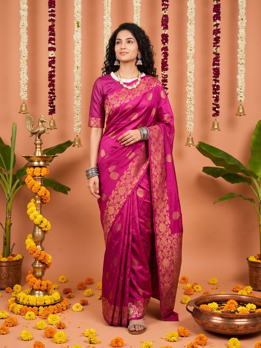 Woman wearing magenta silk blend saree with zari butta (metallic motif) work and magenta blouse