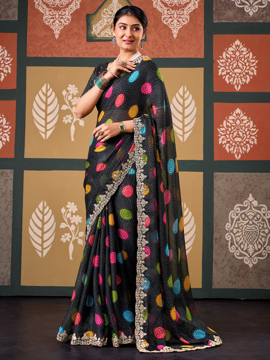 Woman wearing black chiffon saree with bandhani tie-dye dot work and black blouse
