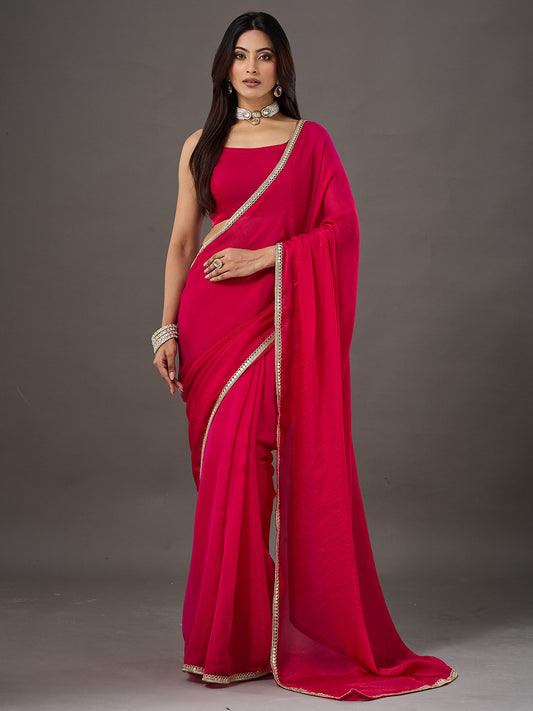 Woman wearing pink georgette saree with clean solid-tone finish and pink blouse
