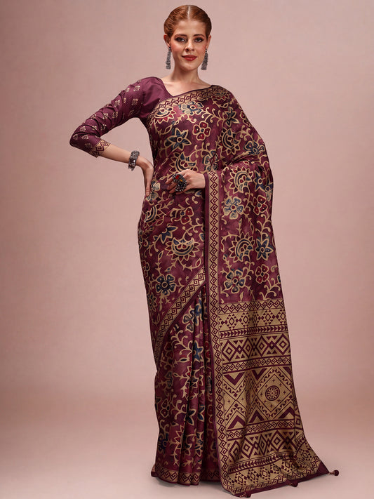 Woman wearing wine silk blend saree with traditional indian motif work and wine blouse