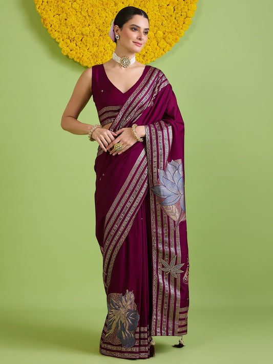 Woman wearing wine silk blend saree with woven motif design and wine blouse