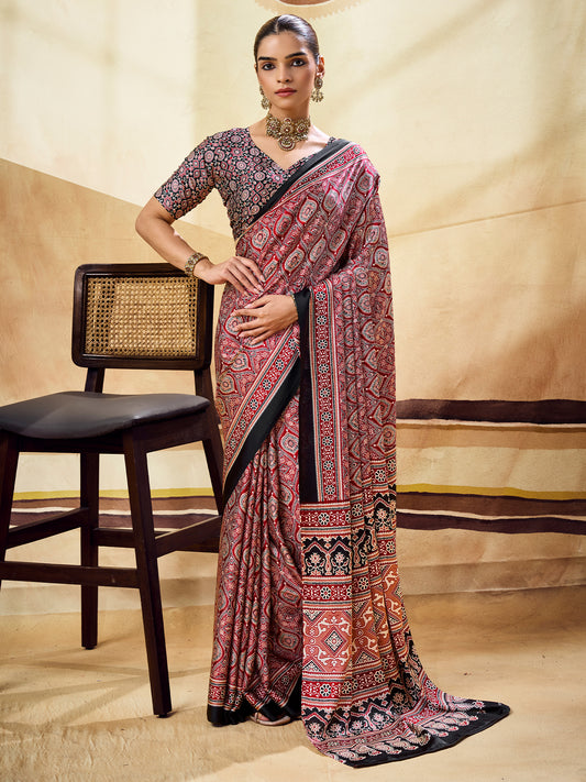 Woman wearing maroon satin saree with ajrak block-print motif work and black blouse