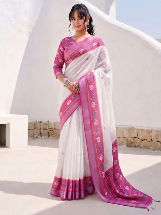Woman wearing white cotton linen saree with traditional indian motif work and pink blouse
