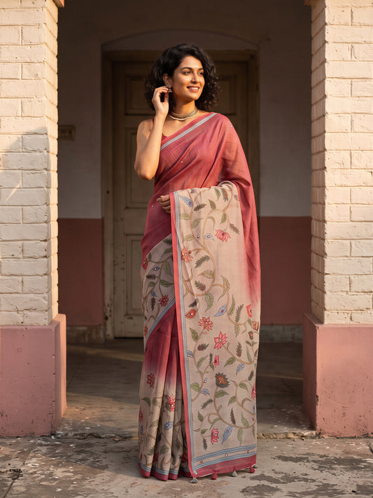 Woman wearing maroon linen blend saree with kalamkari narrative motif work and maroon blouse