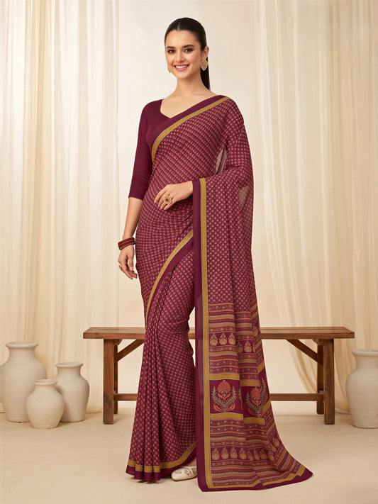 Woman wearing magenta crepe saree with batik wax-resist design and magenta blouse