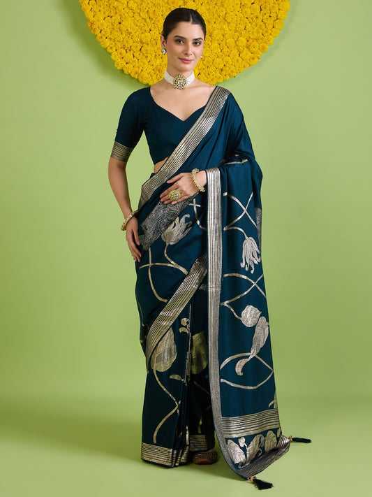 Woman wearing navy blue silk blend saree with all-over floral design and navy blue blouse
