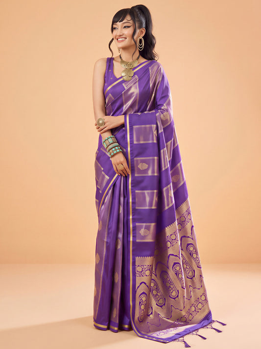 Woman wearing purple satin saree with traditional indian motif work and purple blouse