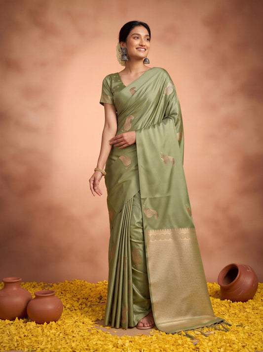Woman wearing olive satin silk saree with animal-print design and olive blouse