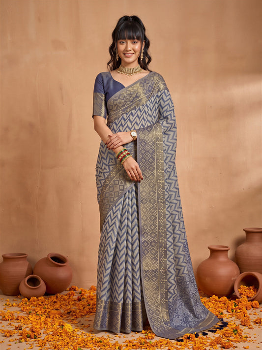 Woman wearing blue viscose saree with geometric pattern design and blue blouse
