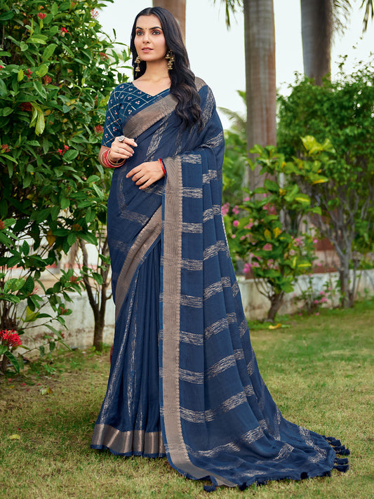 Woman wearing navy blue georgette saree with striped pattern design and navy blue blouse