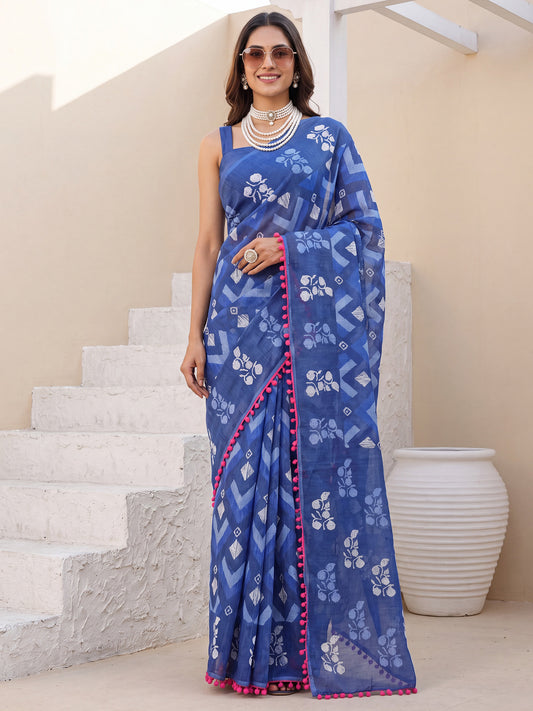 Woman wearing navy blue cotton saree with chevron zigzag pattern and navy blue blouse
