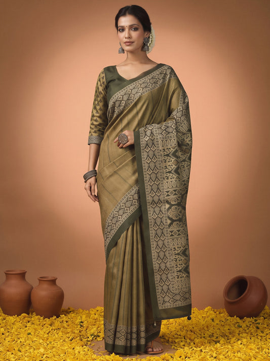 Woman wearing light green silk blend saree with striped pattern design and light green blouse