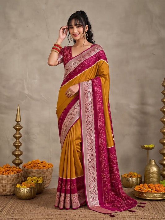 Woman wearing mustard tussar silk saree with bandhani tie-dye dot work and maroon blouse