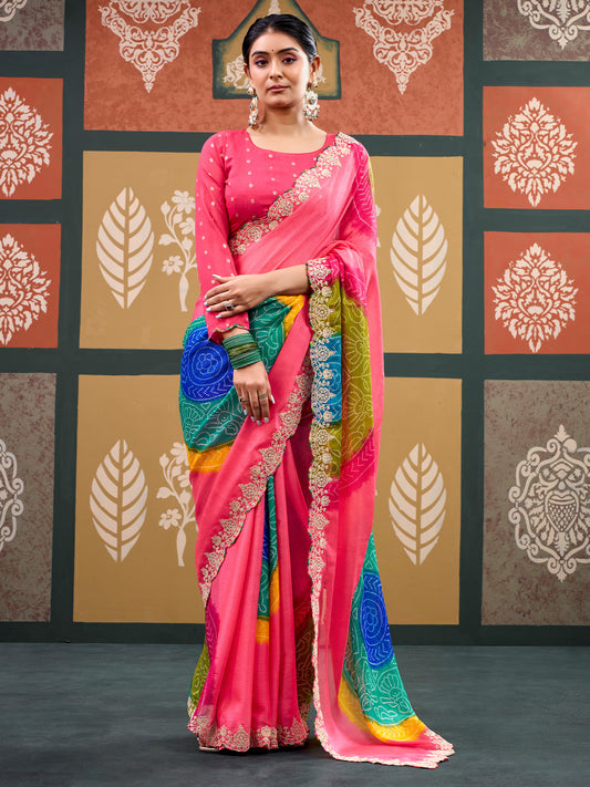 Woman wearing pink chiffon saree with bandhani tie-dye dot work and pink blouse