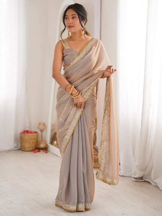 Shimmering Champagne Organza Saree with Mirror Lace