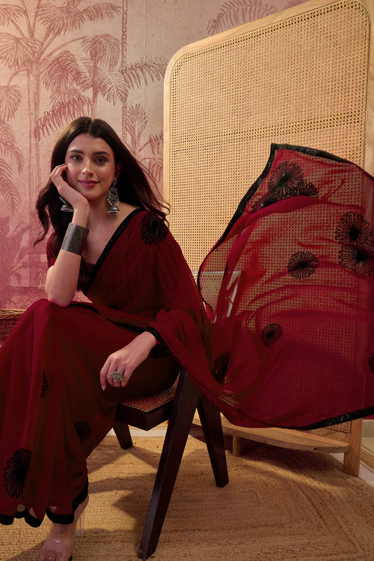 Dhriti Maroon Embellished Georgette Saree with Embellished Border & Maroon Blouse Piece