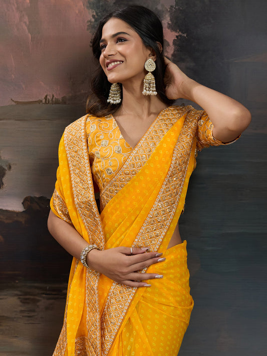 Mango Yellow Bandhani Chiffon Saree with All-Over Self-Tone Dot Weave, Broad Gold Sequin & Zari Embroidered Border & Gold Zardozi Scroll Embroidered Blouse