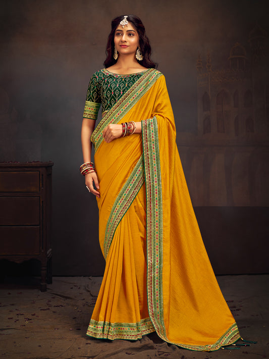 Mustard Yellow Silk Saree with Green Embroidered Blouse