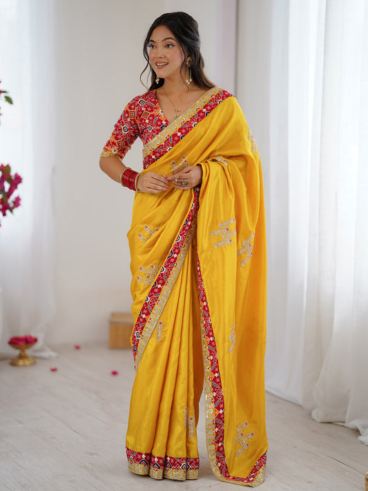 Nilam Yellow Silk Saree with Patola Border & Embroidery
