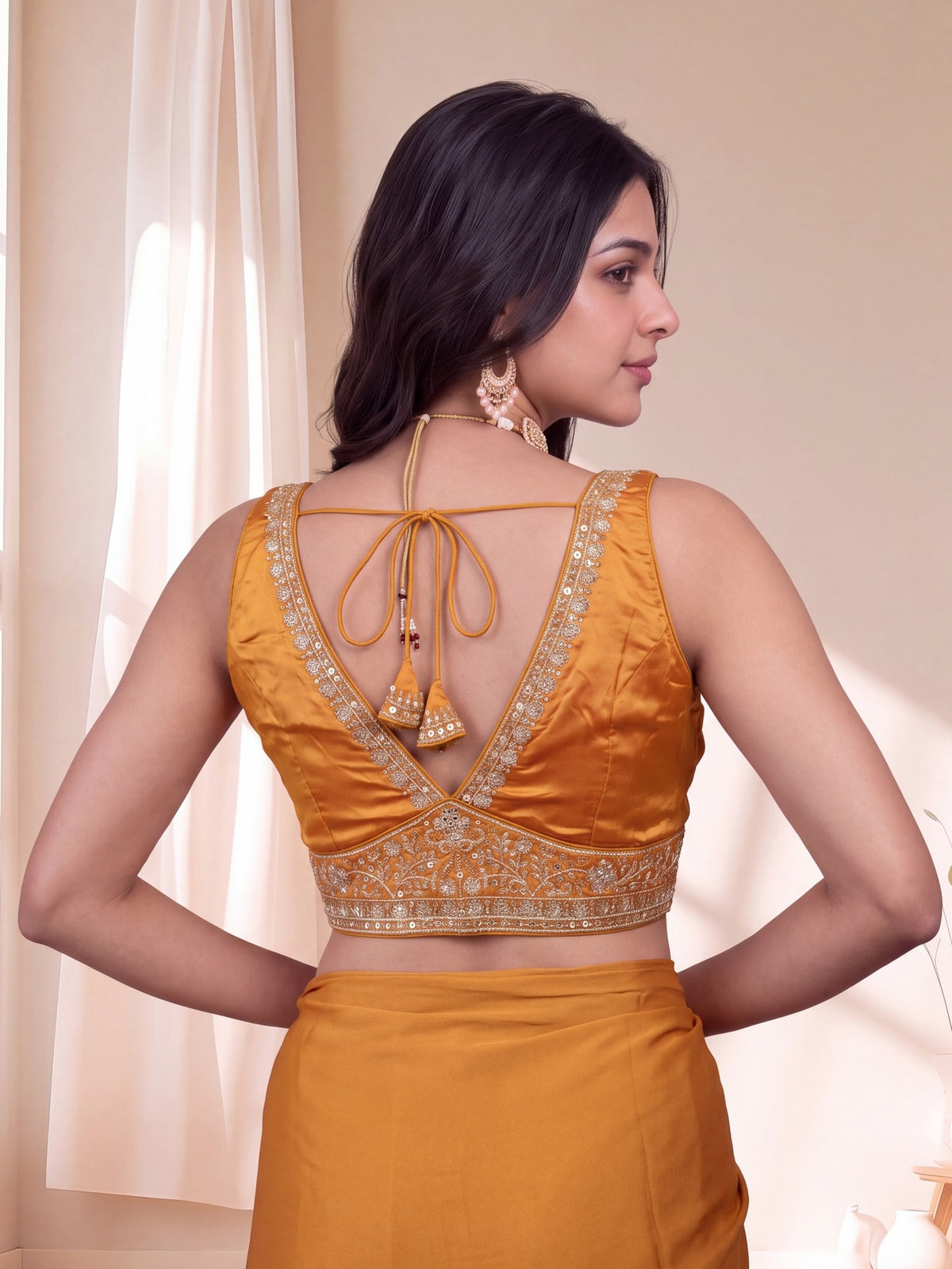 Orange sequin embellished silk blend sleeveless readymade saree blouse with deep v neck view 3