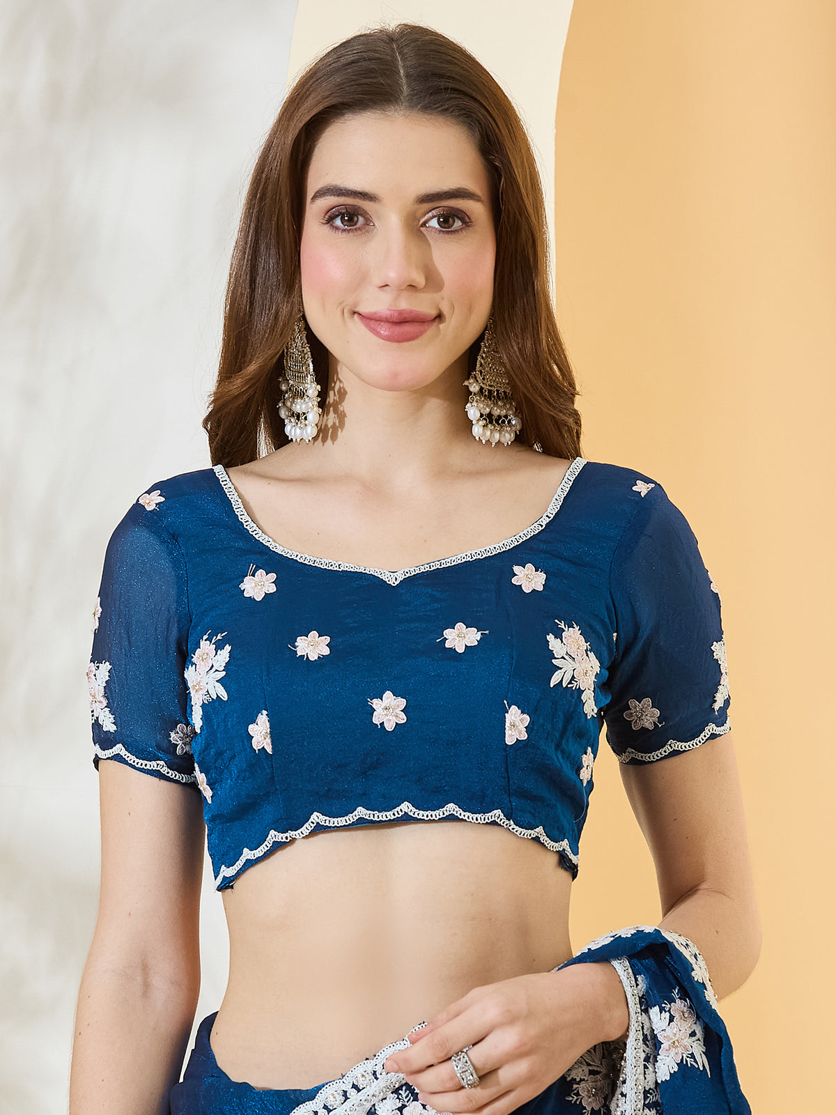 Unstitched teal blue georgette blouse piece with embroidered design