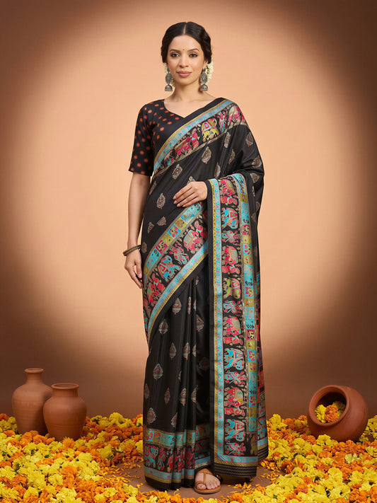 Woman wearing black silk blend saree with metallic foil print work and black blouse