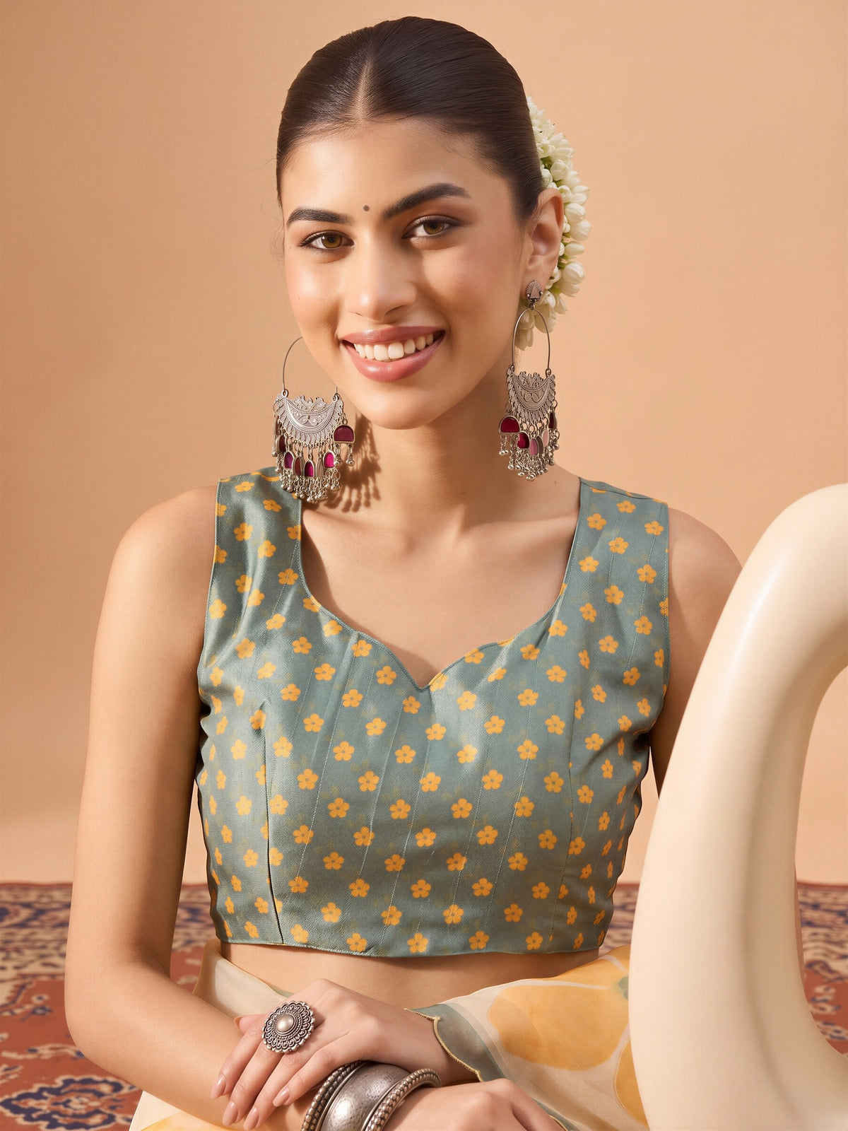 Unstitched sea green organza blouse piece with ethnic motif design