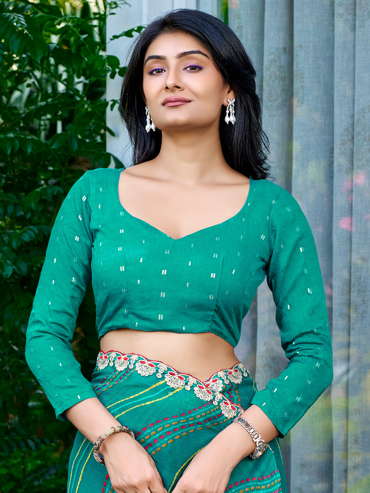 Unstitched teal green georgette blouse piece with zari butta design