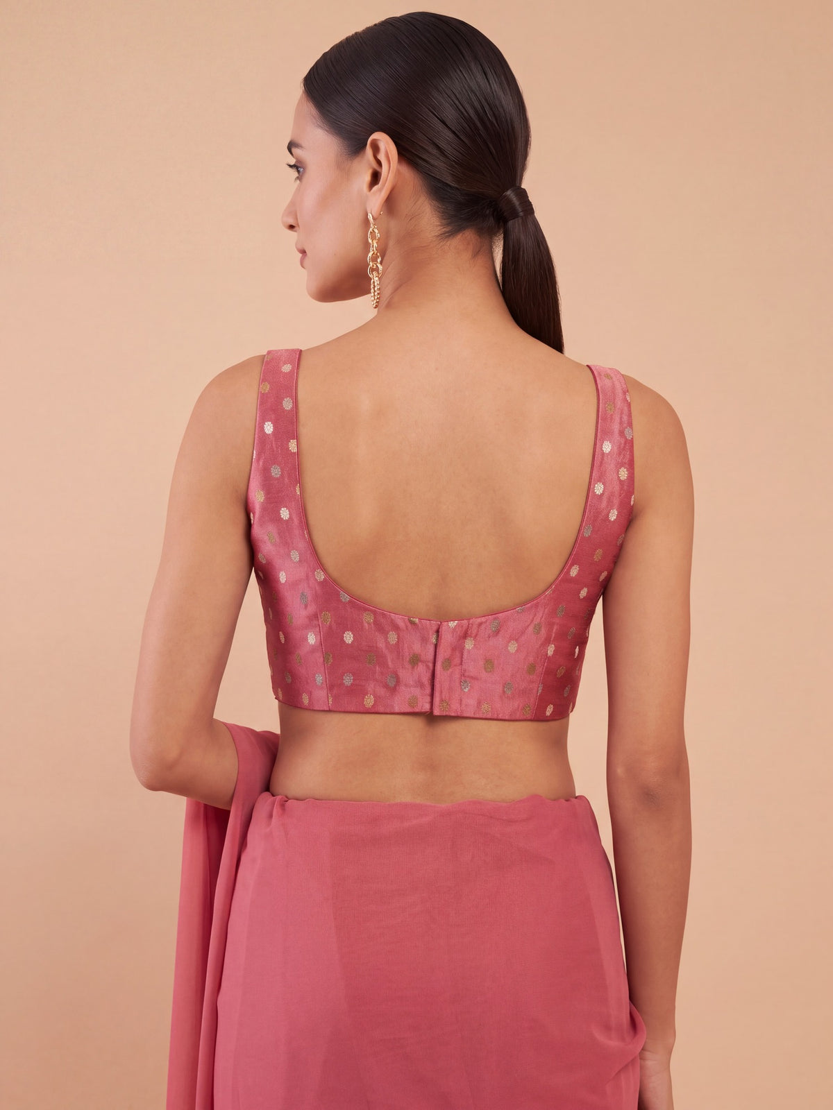 Peach zari woven georgette sleeveless readymade saree blouse with round neck view 1