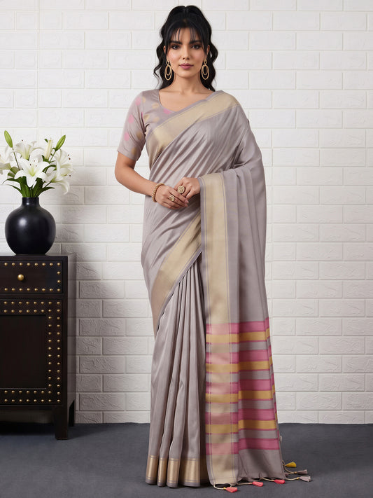 Woman wearing grey bhagalpuri silk saree with traditional indian motif work and grey blouse