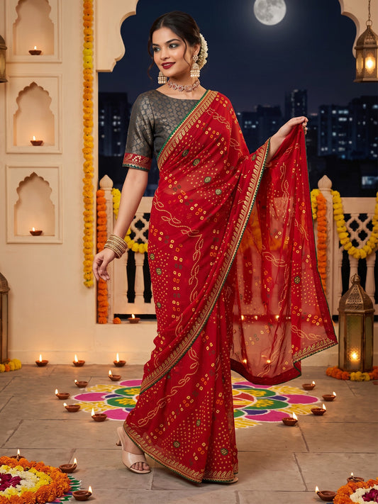 Woman wearing red georgette saree with bandhani tie-dye dot work and green blouse