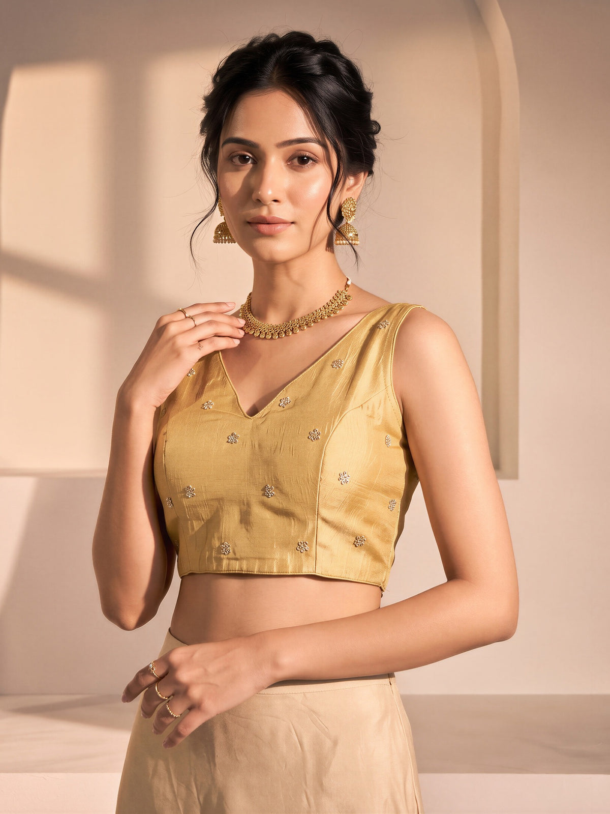 Gold sequin embellished vichitra silk sleeveless readymade saree blouse with v neck