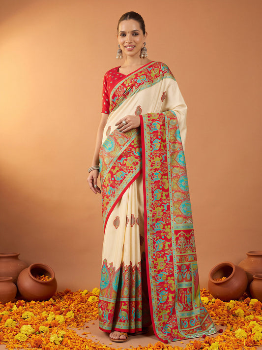 Woman wearing red silk blend saree with metallic foil print work and red blouse