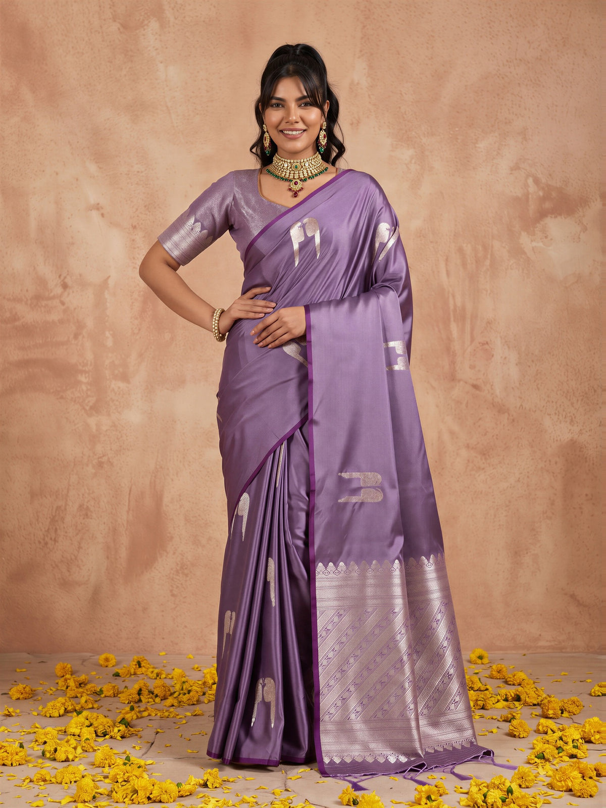 Woman wearing lavender satin saree with botanical floral and leaf design and lavender blouse